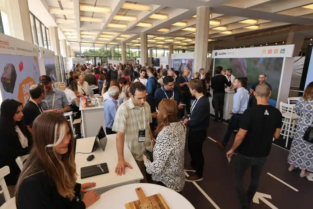 Attendees networking in the exhibit hall at the Future Food-Tech summit.
