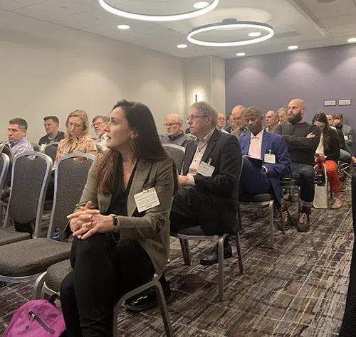 Audience members seated at the Animal AgTech Innovation Summit panel discussion.