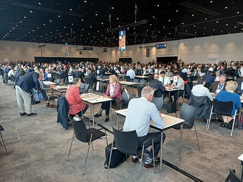 Attendees seated at tables during the ISF World Seed Congress 2024.