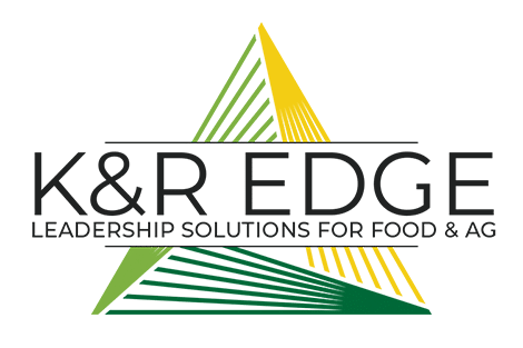 K&R Edge logo. Green and yellow triangle overlayed with the text "K&R EDGE Leadership Solutions for Food & Ag"